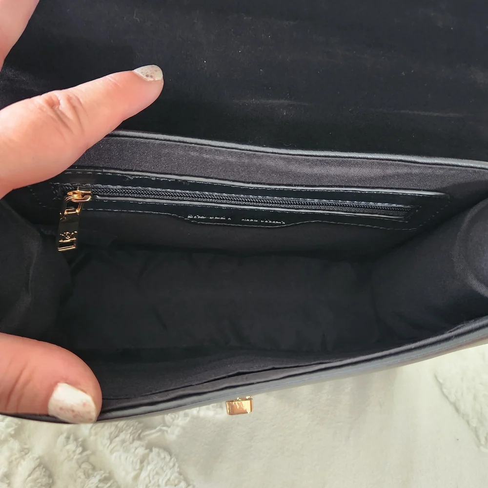Badgley Mischka Black Vegan Leather Top-Handle Satchel With Crossbody Strap.